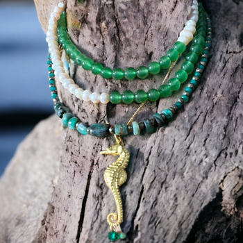 Golden Seahorse Pendant by Viviana Puello