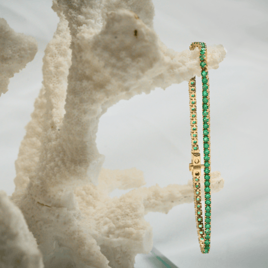 Minimalist Infinity Bracelet with Colombian Emeralds by Viviana Puello